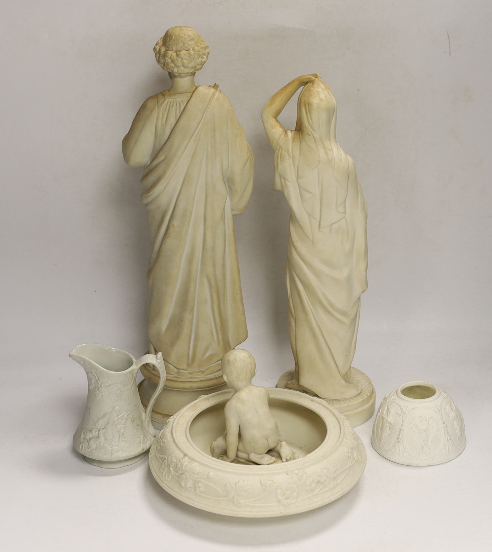 A collection of parian ware including figures and a small Portmeirion jug, tallest 38.5cm (6)